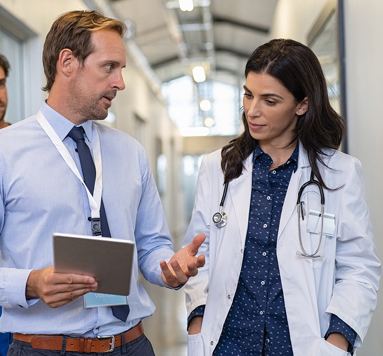 ABW-Medical-business-transformation-services-medical-professionals-discussing ABW Medical business transformation services