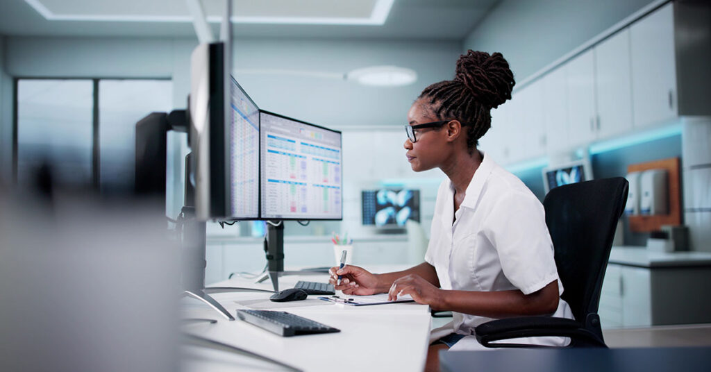 ABW Medical Hospital Doctor Using Spreadsheet For Billing Codes On Desktop
