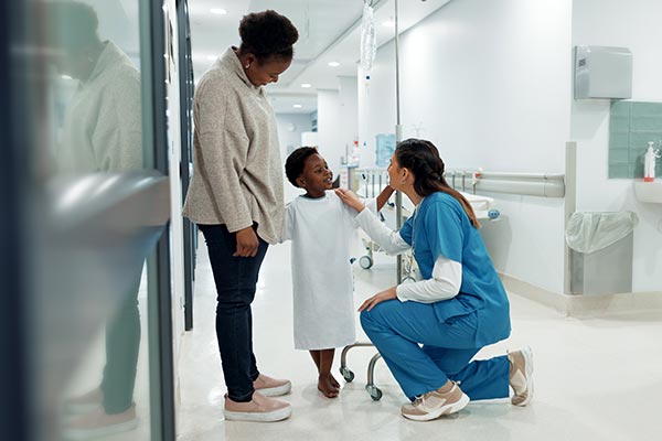 ABW Medical privia health centers female nurse chatting with young patient